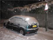 green car white snow ford focus guildford england january 2010 by roadsofstone