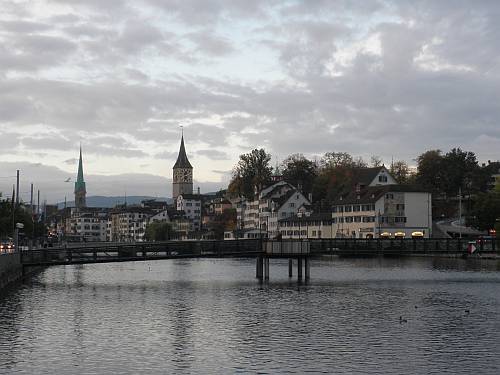 october morning  fraumünster and st peter river limmat zürich switzerland by roadsofstone